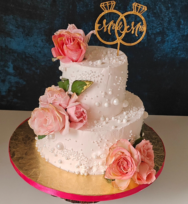 Two tier white pearl wedding cake with roses and gold ring topper - Vivante Patisserie Bangalore